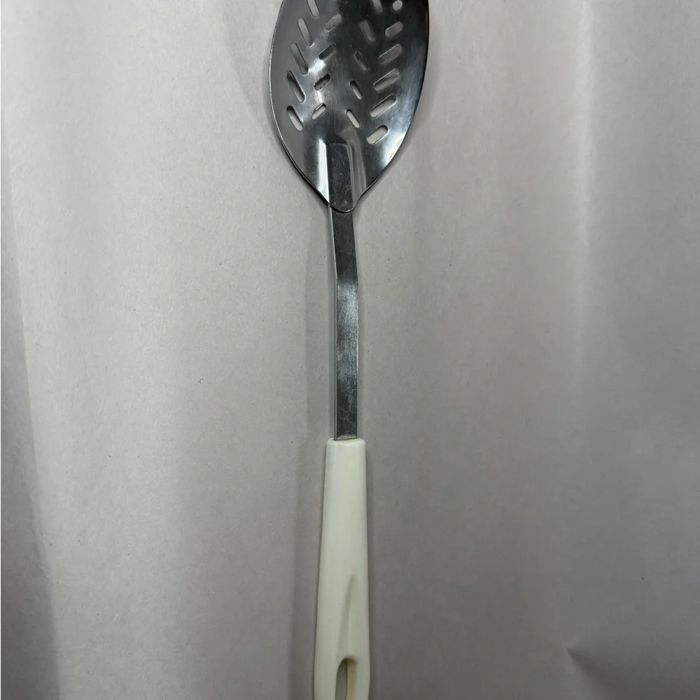 Elegant Slotted Spoon with Cream Handle